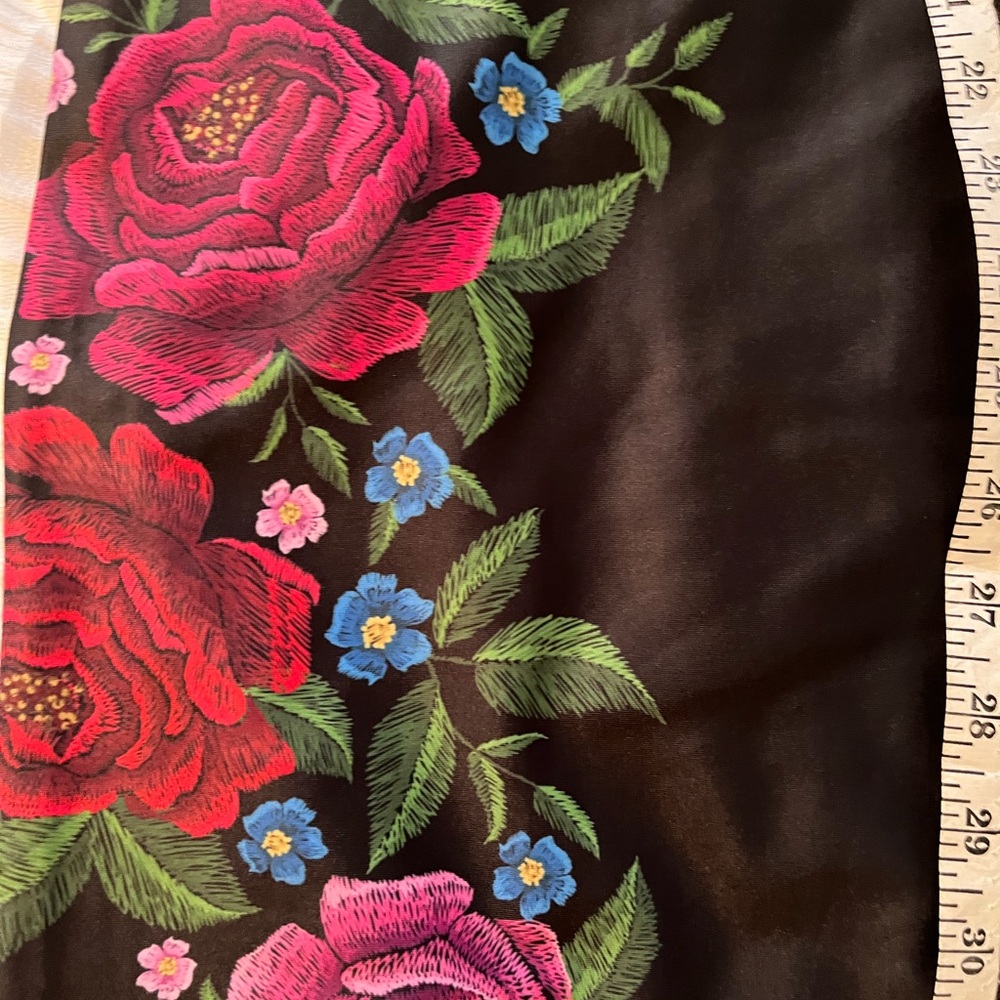 Black sleeveless dress with flower print